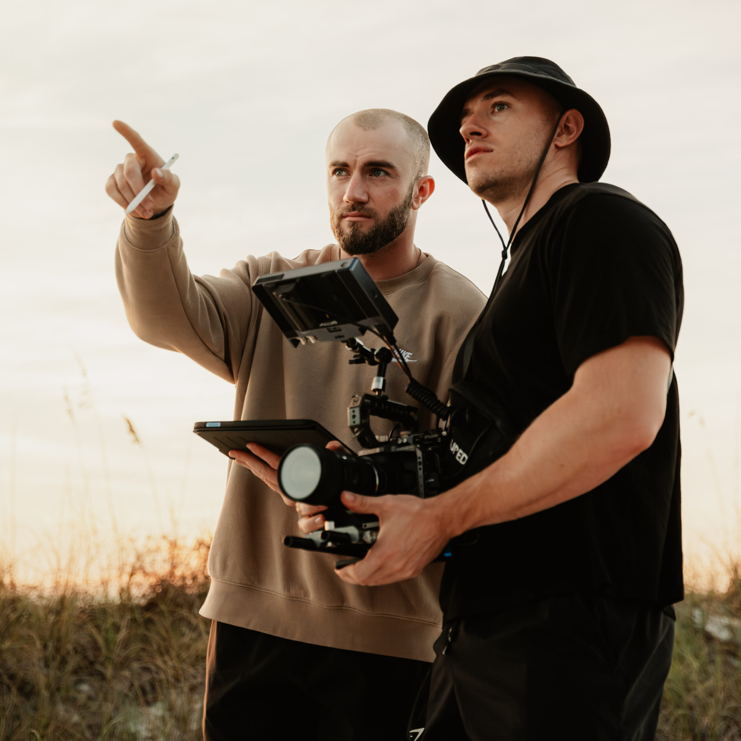 Taylor and Ryan Daugherty onsite for a production on a beach location in Tampa Bay